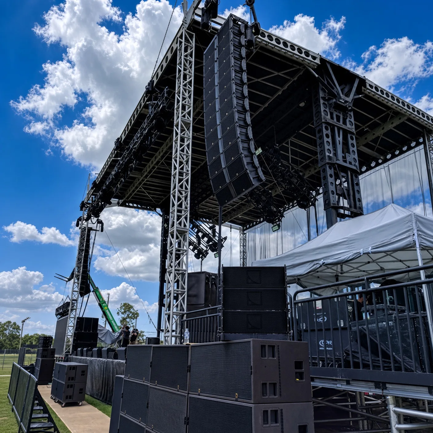 Outdoor concert audio system and suspended speaker arrays